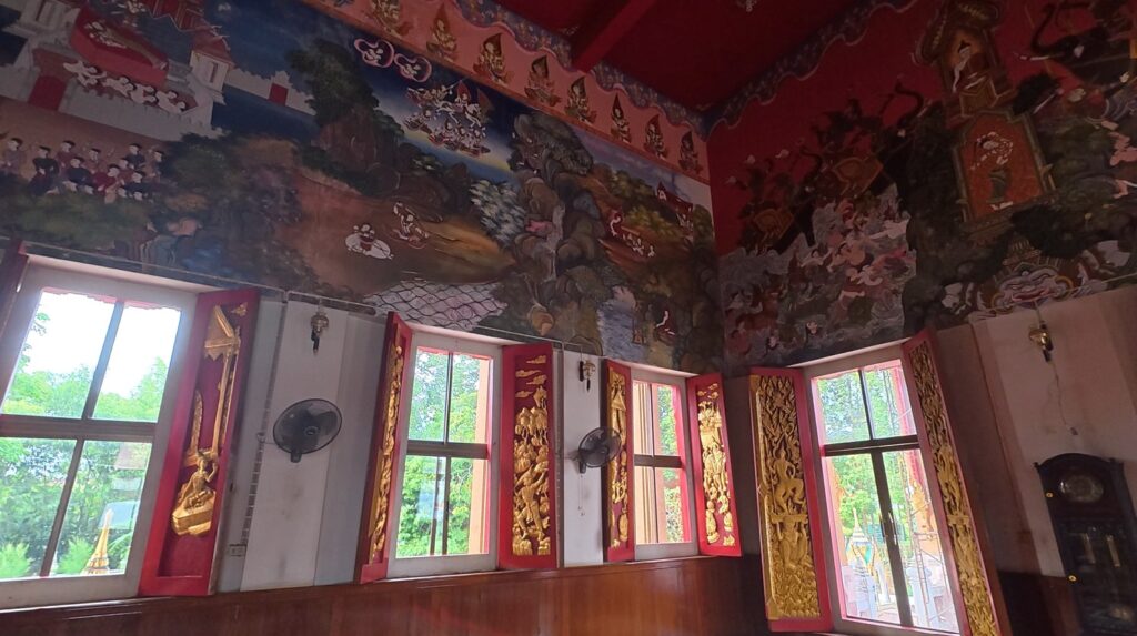 Buddhist murals inside the new Ubosot at Wat Tapon Yai