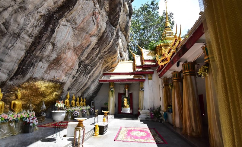 Cliffside sanctuary at Wat Phra Phutthachai in Thailand