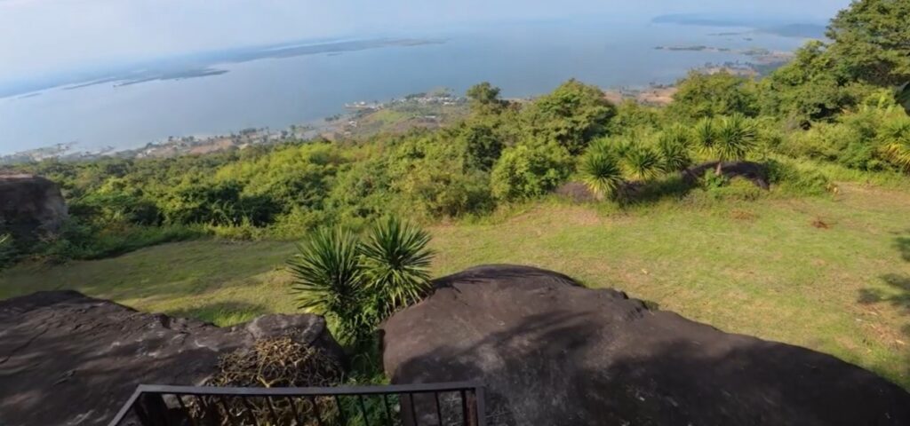 Walking beneath massive rock formations at Hin Chang Si, Khon Kaen