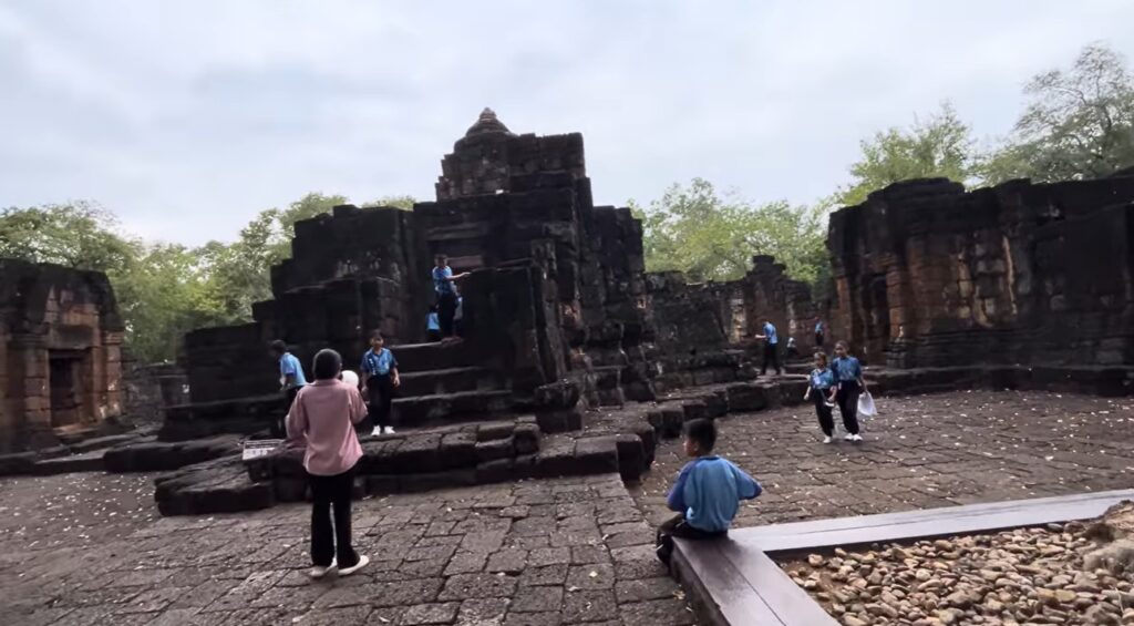 Students learning among the ruins of Mueang Sing Historical Park
