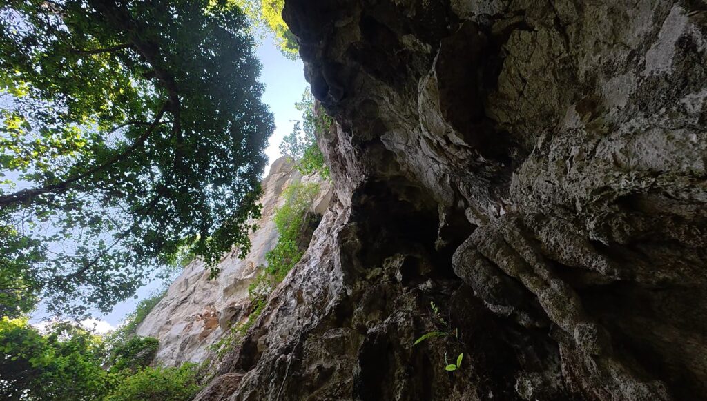Entrance to Tham Khao Cha Ang Ha Yot limestone cave in Rayong