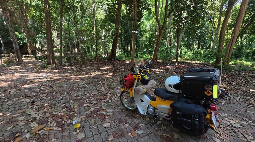 Honda Super Cub parked at Tham Khao Cha Ang Ha Yot in Rayong