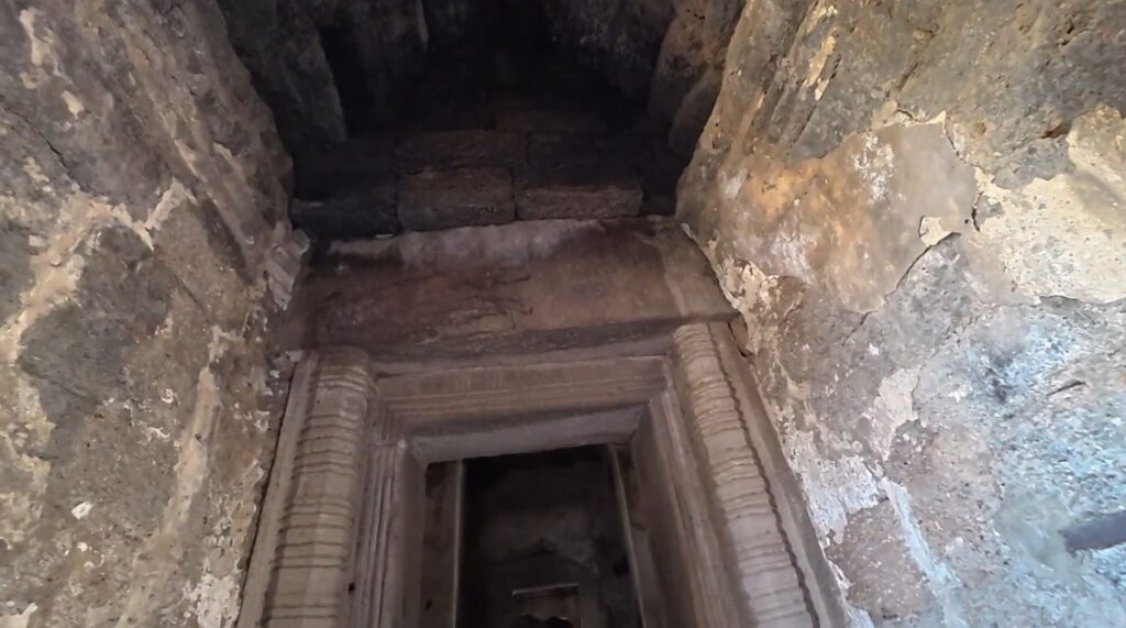 Weathered walls and ancient stone structure at Phra Prang Sam Yot in Lopburi