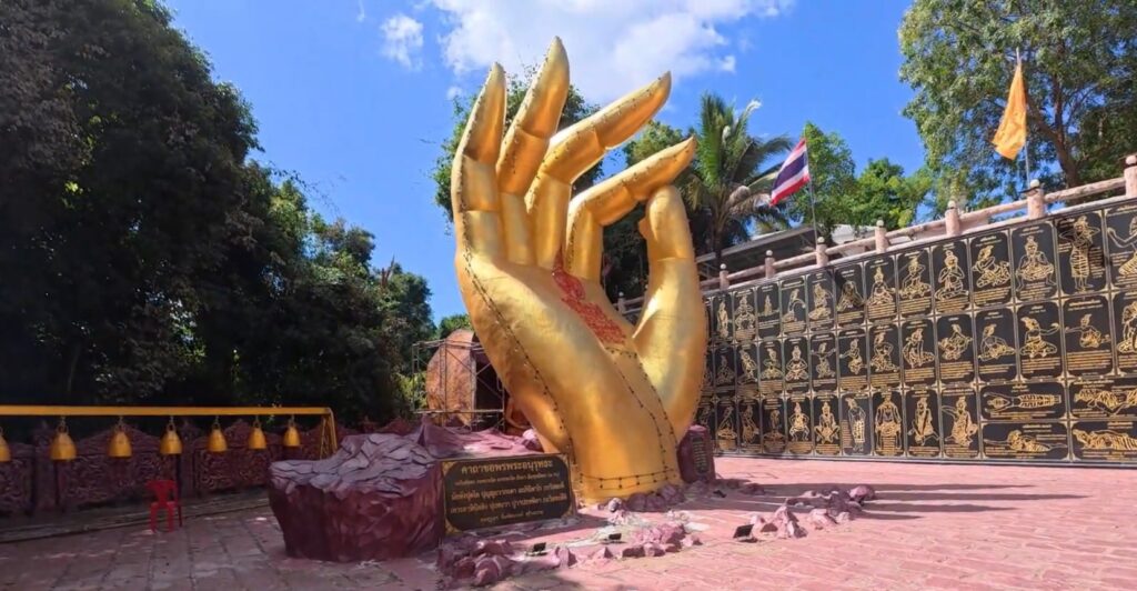 Golden serpent sculpture at Wat Khao Bang Hoei Chumphon Simaram
