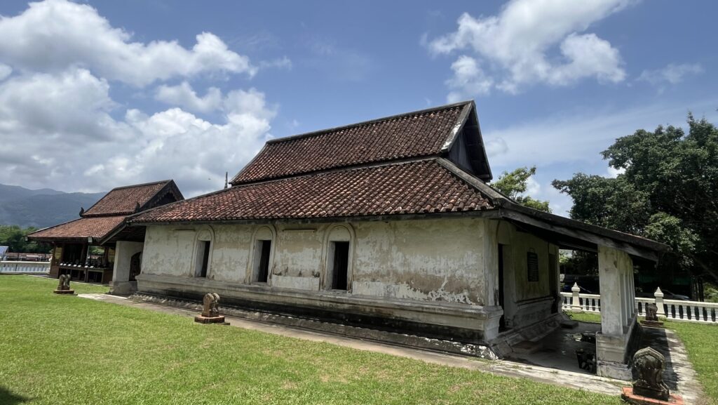 Historic Ubosot of Wat Thong Thua surrounded by ancient Bai Sema stones