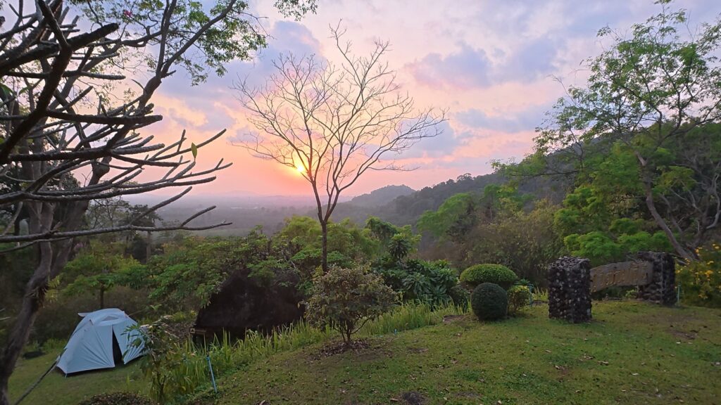Chanthaburi camping ride at sunset with a small tent in Thailand