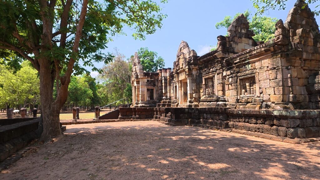 Walking beside the outer gallery of Sadok Kok Thom