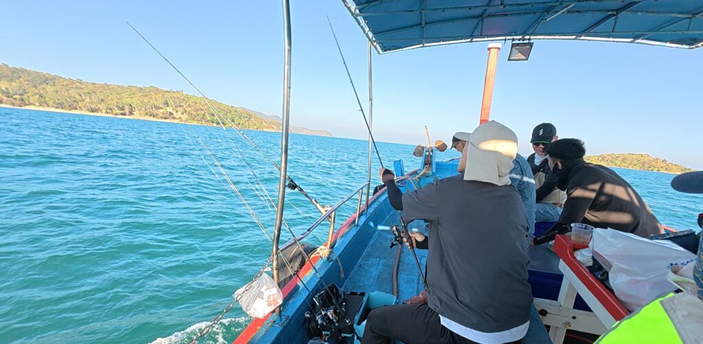 Friends traveling to the coast for a relaxed sea fishing trip