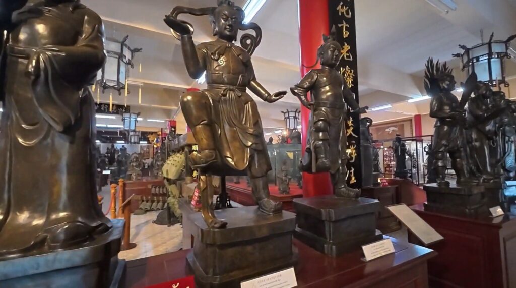 Life-sized Chinese warrior sculptures inside Viharn Sien