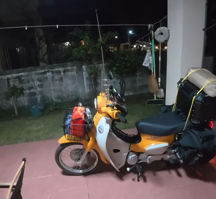 Yellow Honda Cub finally home after a 12-day journey through Thailand