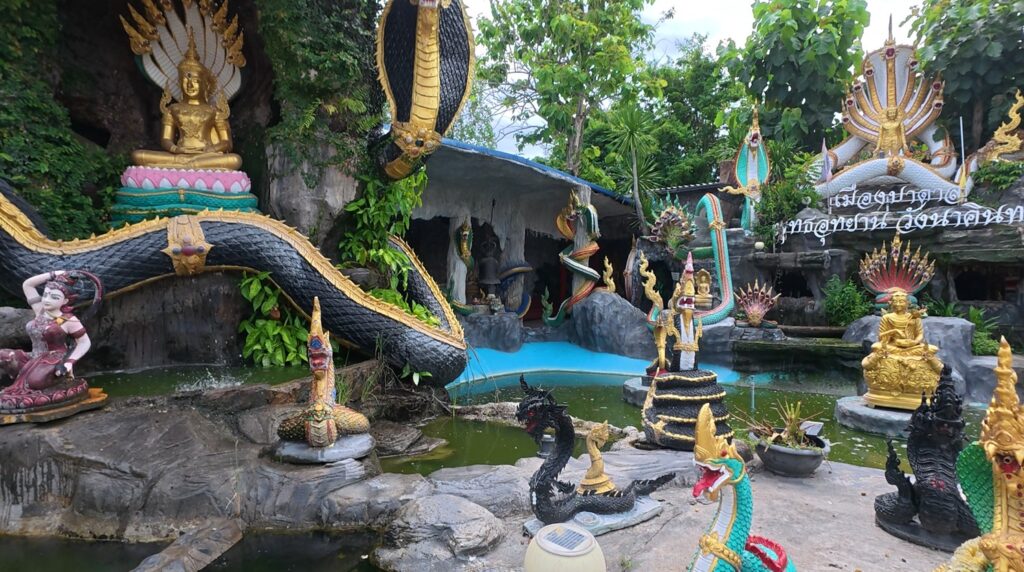 Naga and sacred statues at Anan Burapharam meditation sanctuary near Pattaya