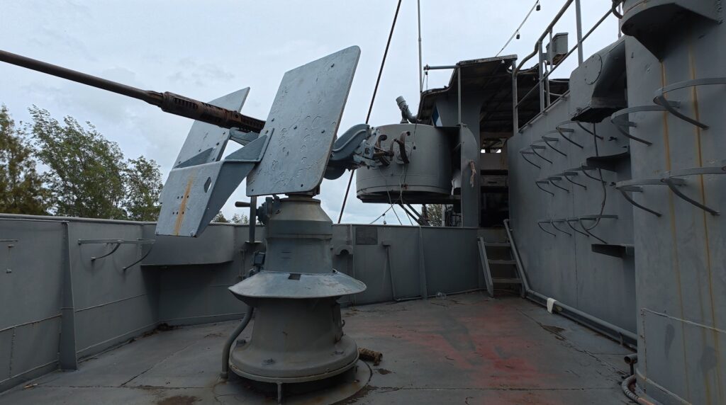 Naval gun aboard HTMS Prasae 412 memorial warship in Rayong