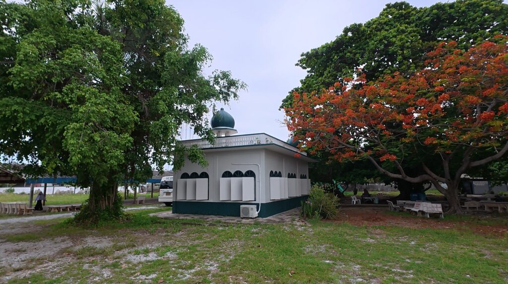 White mosque building near a Muslim cemetery in Rayong