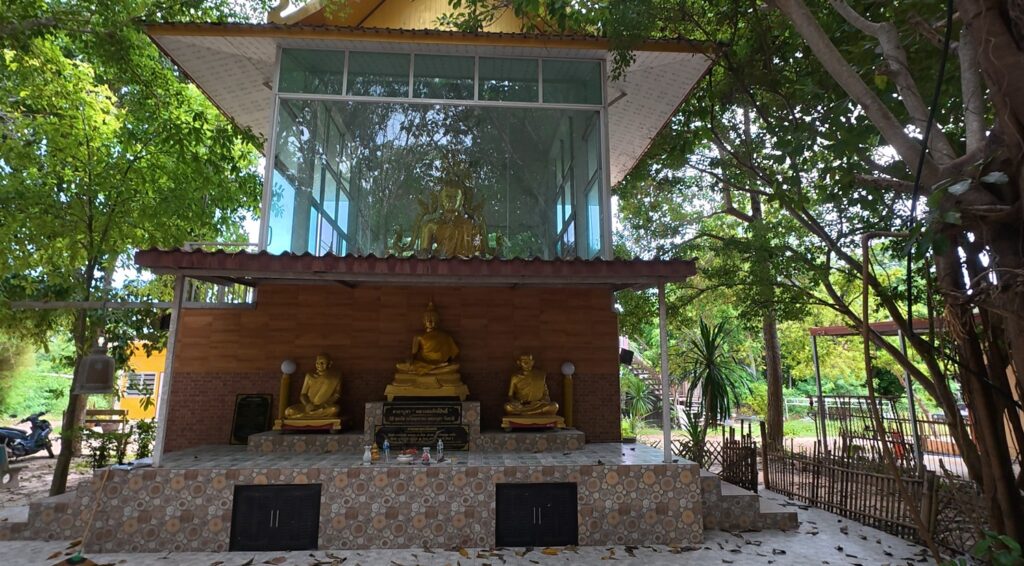 Buddha statue inside an open teaching hall at Anan Burapharam sanctuary