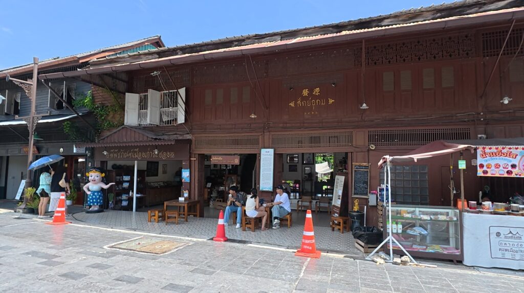 Historic wooden Chinese shophouses on Yomjinda Road in Rayong