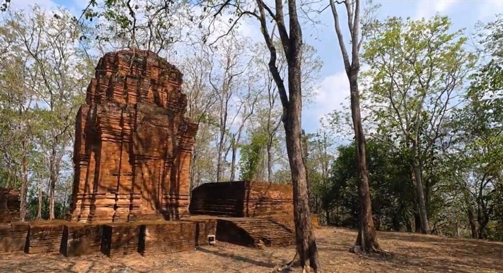 Ancient ruins of Prasat Khao Noi surrounded by forest in Sa Kaeo
