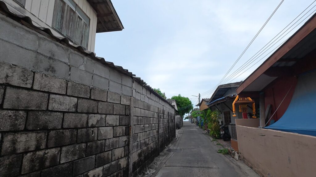 Narrow lane through an old fishing village in Rayong