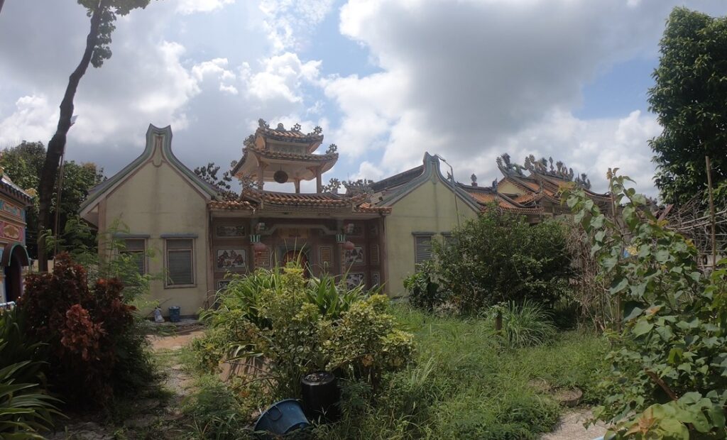 Upper prayer halls and revered Buddhist masters at Wat Mangkorn Buppharam in Chanthaburi