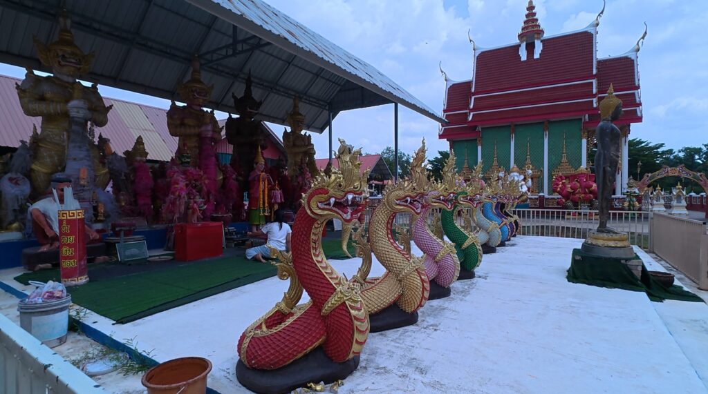 Buddhist, royal and mythological statues together at Wat Ang Kaeo