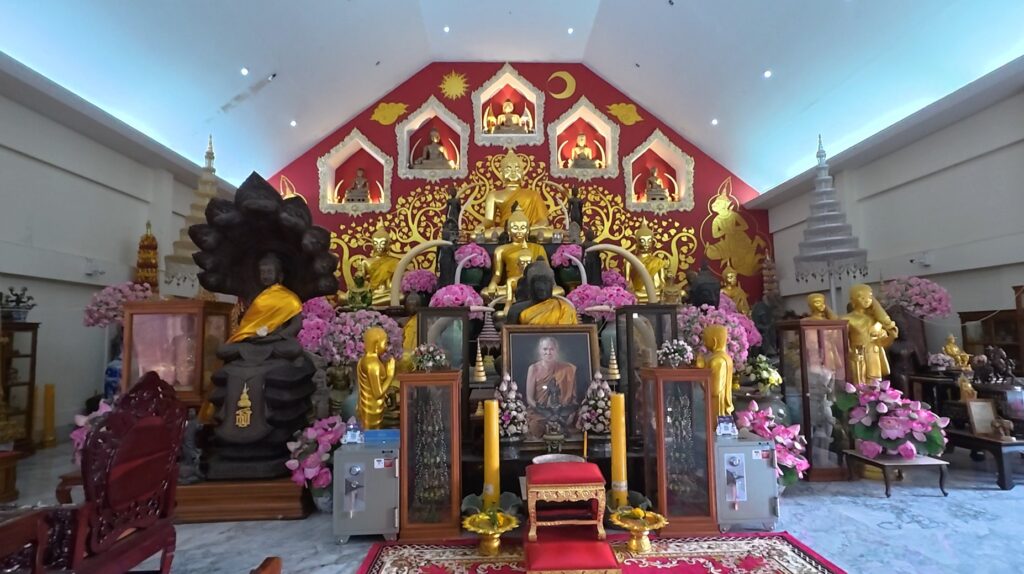 Buddhist shrine inside Wat Tham Wattana Mongkol in Rayong Thailand