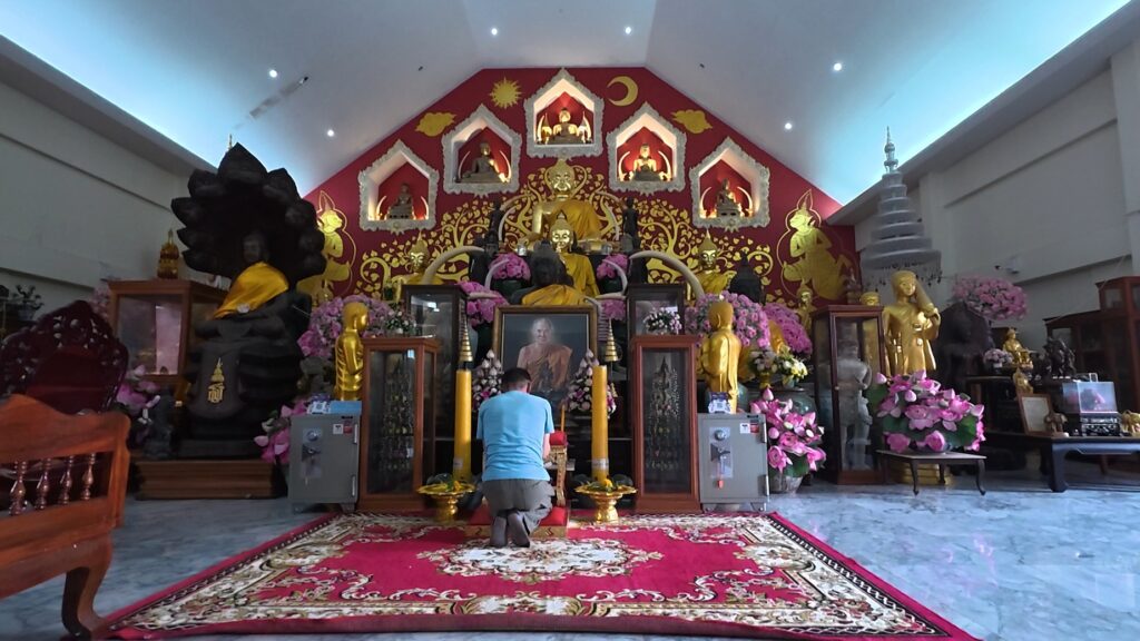 Buddhist shrine inside Wat Tham Wattana Mongkol in Rayong Thailand