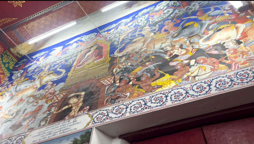 Painted ceiling inside the old ubosot of Wat Mai Ket Ngam