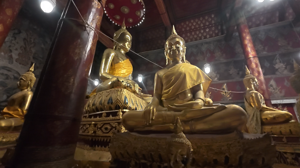 Principal Buddha image and altar inside Wat Yai Intharam