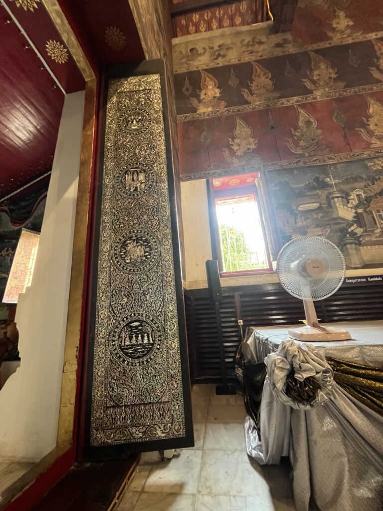Mother-of-pearl inlaid door inside Wat Yai Intharam’s historic ubosot