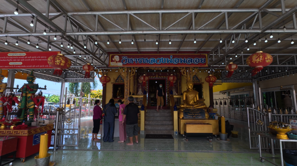 Entrance to the shrine of Luang Pho Ploy at Wat Tao Pun, Chonburi
